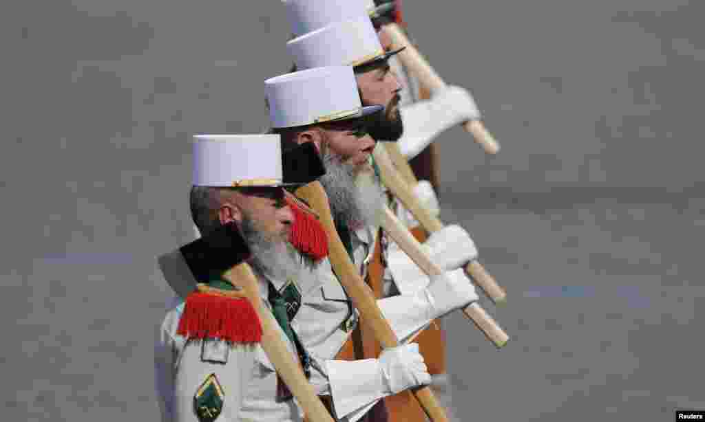 Soldiers from French Foreign Legion take part in the traditional Bastille Day military parade in Paris.