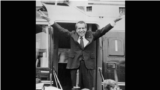 Richard Nixon says goodbye to members of his staff outside the White House in Washington as he boards a helicopter for Andrews Air Force Base after resigning the presidency in Washington, D.C., August 9, 1974. (AP Photo)