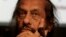 FILE - Rajendra Kumar Pachauri, Chairman of the Inter- governmental Panel on Climate Change, IPCC, listens during a briefing at the UN Climate Summit in Copenhagen.