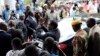 Zimbabwe President Sees Deceased Opposition Leader's Family
