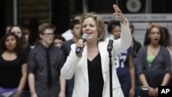 Famed soprano Renee Fleming performs with high school students in Chicago, where the opera singer has been mentoring teenaged vocal students as creative consultant at the Lyric Opera of Chicago.