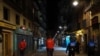 FILE - Police officers patrol a street before closing all bars and restaurants at 10 p.m. due to the new measures to prevent the spread of the coronavirus, in Pamplona, northern Spain, Oct. 16, 2020. (AP)