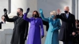 President-elect Joe Biden, his wife Jill Biden, Vice President-elect Kamala Harris and her husband Doug Emhoff salute as they arrive ahead of the inauguration of Biden, in Washington, U.S., January 20, 2021. (REUTERS/Mike Segar)