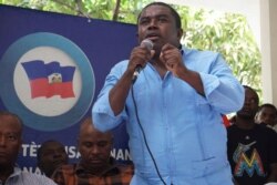 FILE - Opposition leader Andre Michel gives a press conference in Port-au-Prince, Haiti, Sept. 29, 2019.