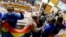People react during a session of the Senate to approve a same-sex marriage bill in Valparaiso, Chile, Dec. 7, 2021. 