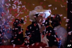Pedro Castillo speaks to his supporters after election authorities declared him president-elect, during celebrations at his party's campaign headquarters in Lima, Peru, July 19, 2021.