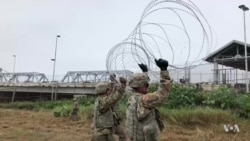 Troops at the US Border are Stringing Wire and Building Barracks