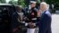 FILE — US President Joe Biden greets Kenya’s President William Ruto upon his arrival at the South Portico of the White House in Washington, DC, on May 22, 2024. 