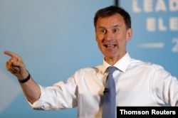 Jeremy Hunt, a leadership candidate for Britain's Conservative Party, attends an event in Wyboston, Britain, July 13, 2019. Hunt, Britain's foreign secretary, says the Iran nuclear deal can still be saved.