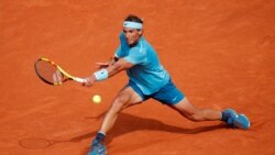 VOA Game Room - Tennis titans clash in Paris, NBA and NHL titles on the line, an Italian golf winner, better concussion treatment