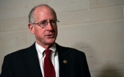 FILE - Rep. Mike Conaway, R-Texas, speaks to reporters on Capitol Hill in Washington, Jan. 16, 2018.