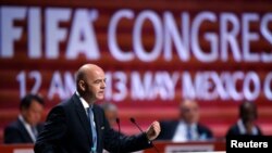 Presiden FIFA Gianni Infantino berpidato dalam Kongres FIFA ke-66 di Mexico City, Meksiko (13/5). (Reuters/Edgard Garrido)