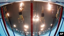 মাইকেল ফেল্পস এবং রায়ান লকটের মধ্যে তুমূল প্রতিদ্বন্দ্বিতা 