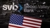 Illustration shows destroyed SVB (Silicon Valley Bank) logo and U.S. flag