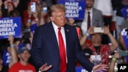 FILE - Republican presidential nominee former President Donald Trump at a campaign rally in Erie, Pennsylvania, Sept. 29, 2024. Prosecutors allege Tehran tried to hack figures associated with the presidential election, stealing information from Trump's campaign.