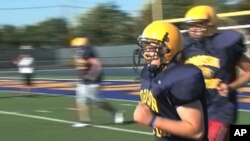 Members of Fordson High School football team in Dearborn, Michigan during practice session