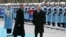 FILE - Russian President Vladimir Putin (R) and his Turkish counterpart Recep Tayyip Erdogan inspect military honour guard during a welcome ceremony in Ankara, Turkey, Dec. 1, 2014.
