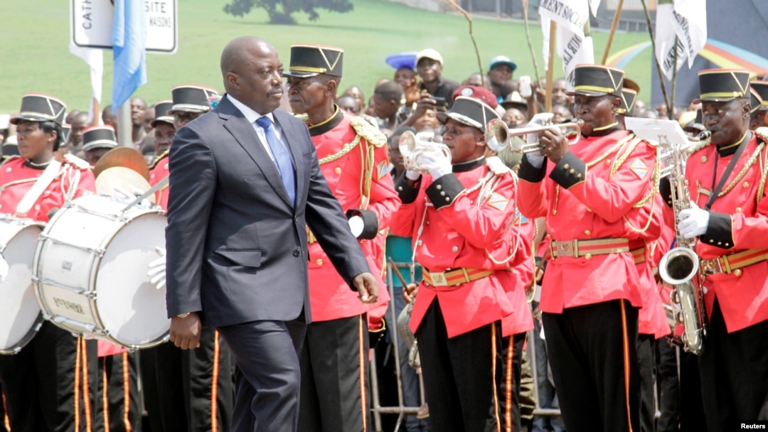 FILE - Democratic Republic of the Congo President Joseph Kabila inspects a guard of honor during the anniversary celebrations of the DRC's independence from Belgium in Kindu, DRC, June 30, 2016.