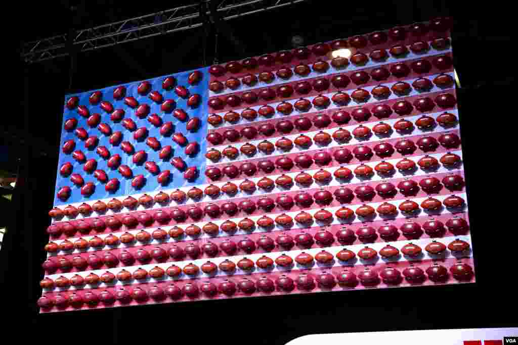 The Super Bowl is the most-watched American sporting event of the year. This American flag has been decorated with Wilson footballs, the company that manufactures every football that is used by the NFL. (B. Allen/VOA)