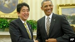 Japanski premijer Šinzo Abe i predsednik Barak Obama tokom susreta u Beloj kući