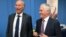 Conservative Liberal party MP John Alexander laughs as he stands with Australian Prime Minister Malcolm Turnbull during a visit to a printing company in Sydney, Australia, April 4, 2017.