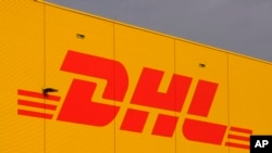 Foto Achiv: Logo konpayi Alman DHL nan Leipzig/Halle, Almay. 