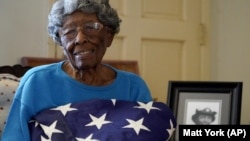  World War II veteran Maj. Fannie Griffin McClendon poses at her home, Thursday, June 10, 2021, in Tempe, Ariz. (AP Photo/Matt York)