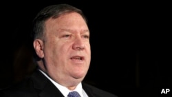 FILE - U.S. Secretary of State Mike Pompeo delivers a speech in Washington, July 30, 2018. Pompeo warned on Sept. 28, 2018, that the United States would hold Iran directly responsible for any attacks on Americans and U.S. diplomatic facilities in Iraq.
