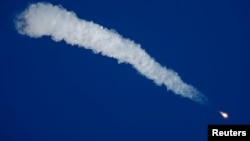 The Soyuz MS-10 spacecraft carrying the crew of astronaut Nick Hague of the U.S. and cosmonaut Alexey Ovchinin of Russia blasts off to the International Space Station (ISS) from the launchpad at the Baikonur Cosmodrome, Kazakhstan, Oct. 11, 2018. 