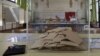 Votes are seen through a polling box during legislative election in Saint Germain-en-Laye, 15 kms west of Paris, Sunday, June 17, 2012.