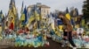 A war veteran visits a makeshift memorial for fallen Ukrainian soldiers at Independence Square in Kyiv, Ukraine, March 5, 2025. 