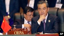 China's Foreign Minister Wang Yi, attends the 23rd ASEAN regional retreat meeting in Vientiane, Laos, July 26, 2016.