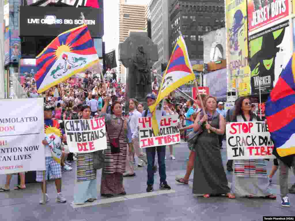 Students for a Free Tibet organized Lhakar vigil to protest China at New York&#39;s Times Square on July 25, 2012. 