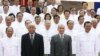 FILE PHOTO - Cambodia's King Norodom Sihamoni, second right, poses for photograph altogether with Hun Sen, right, Cambodian Prime Minister, Chea Sim, second left, Cambodia Senate President, Heng Samrin, left, Cambodian National Assembly President, in front of the National Assembly in Phnom Penh, Cambodia.