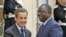 France's President Nicolas Sarkozy (L) greets Senegal's newly-elected President Macky Sall at the Elysee Palace in Paris, April 18, 2012.