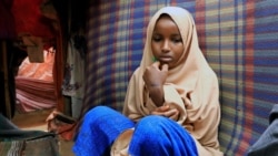 Nurta Mohamed is a Somali girl sitting inside her mom's home in Garasbaaley district of Mogadishu, Somalia on Aug. 14, 2020.