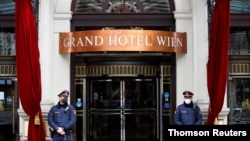 FILE PHOTO: Police stand outside a hotel where a meeting of the Joint Commission of the Joint Comprehensive Plan of Action (JCPOA), or Iran nuclear deal, is held in Vienna, Austria,