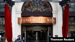 Police stand outside a hotel where a meeting of the Joint Commission of the Joint Comprehensive Plan of Action (JCPOA), or Iran nuclear deal, is held in Vienna, Austria, May 11, 2021.