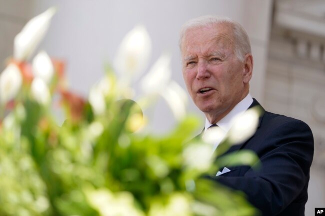 President Joe Biden speaks at the Memorial Amphitheater after laying a wreath at The Tomb of the Unknown Soldier at Arlington National Cemetery on Memorial Day, Monday, May 30, 2022, in Arlington, Va. (AP Photo/Andrew Harnik)