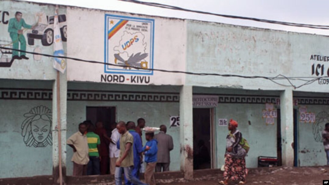 Supporters say they don't trust the results, but say they will not protest until their leader, Etienne Tshisekedi, directs them, outside local opposition headquarters, Goma, DRC, December 6, 2011.