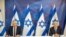 Israeli Prime Minister Benjamin Netanyahu, right, listens at the Israeli Defense Ministry in Tel Aviv, Israel as Alternate PM and Defense Minister Benny Gantz, delivers a statement on July 27 2020.