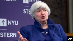 FILE - Federal Reserve Chair Janet Yellen participates in a moderated discussion at New York University's Stern School of Business, Tuesday, Nov. 21, 2017, in New York. 