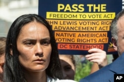 FILE - Navajo attorney Allison Neswood, Native American Rights Fund, appears at a press conference to call to re-up broad support for a package of bills in key voting rights bills, on Capitol Hill, in Washington, Sept. 10, 2024.