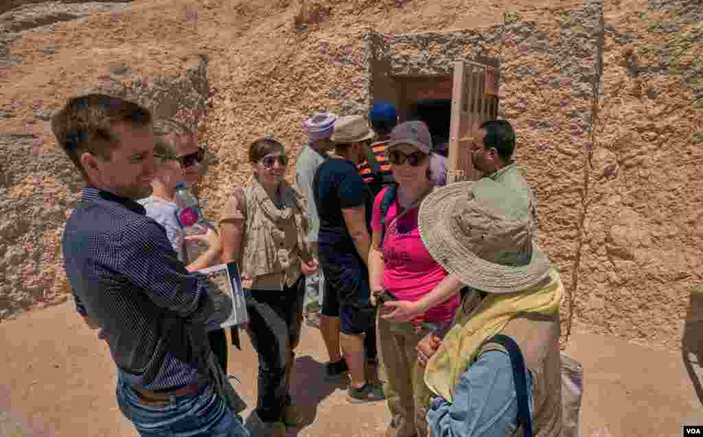 British tourists wait their turn to visit the TT 159 tomb of Raya, dating from the 19th Dynasty. He was an official known as the fourth prophet of Amun. (Photo: H. Elrasam)