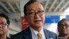 In this photo taken on Nov. 14, 2019, Cambodia's exiled opposition leader Sam Rainsy talks to the media upon arrival at Soekarno-Hatta International Airport in Tangerang, Indonesia.