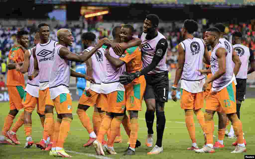 Ivory Coast's Nicolas Pepe celebrates scoring their second goal with teammates; Cameroon, Jan. 16, 2022.