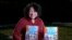 Supreme Court Associate Justice Sonia Sotomayor holds her new children's book "Just Help!" in Washington, Jan. 19, 2022.
