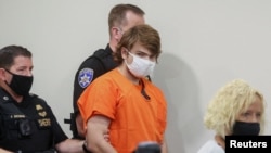 FILE - Buffalo shooting suspect, Payton S. Gendron, appearIing in court accused of killing 10 people in a live-streamed supermarket shooting in a Black neighborhood of Buffalo, New York, May 19, 2022. 
