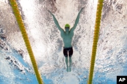 Australia's Brendon Smith swims to win the bronze medal in the 400-meter individual medley at the 2020 Summer Olympics, July 25, 2021, in Tokyo.