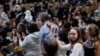 People applaud as they listen to Chandni Raina during a closing plenary meeting, at the COP29 United Nations Climate Change Conference, in Baku, Azerbaijan Nov. 24, 2024. 